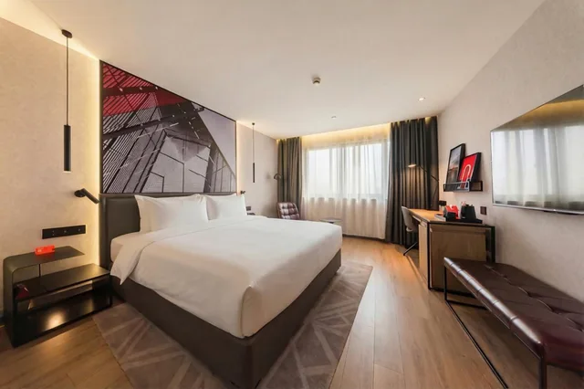 غرفة سوبيريور بسرير كوين، Jinjiang Metropolo Hotel Shanghai Baiyulan 1/1