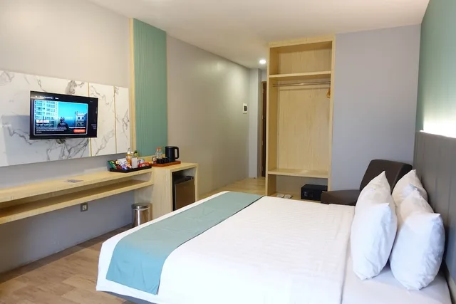غرفة غراند ديلوكس بسرير مزدوج، Grand Kangen Hotel Urip Sumoharjo 1/10