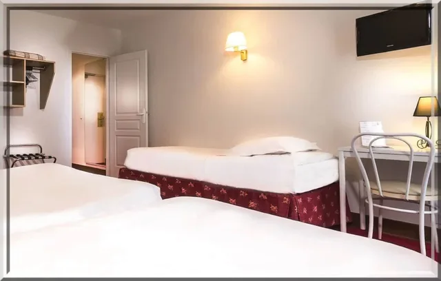 غرفة بسريرين منفصلين، Hotel Le Clos D Alesia 1/4