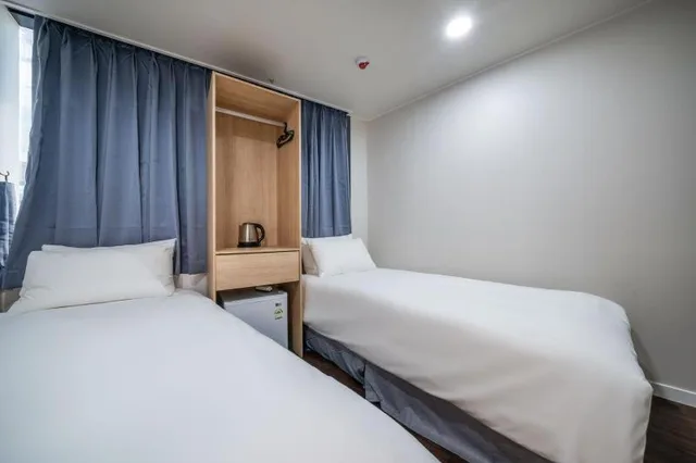 غرفة بسريرين منفصلين، Hotel Mayone 1/4