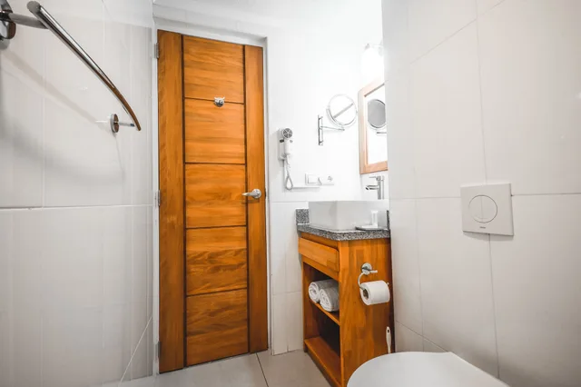 جناح إليت بسريرين كينج بغرفتي نوم مع أريكة بمطبخ صغير، City Suites Curacao 7/7