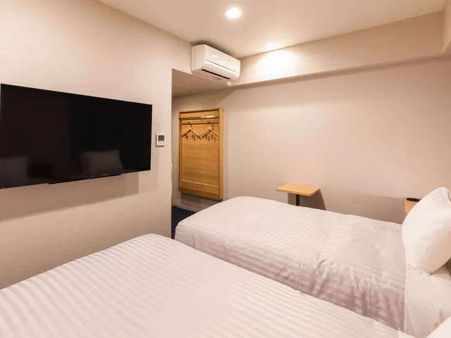غرفة متصلة بسريرين منفصلين، Sotetsu Fresa Inn Nagoya-Shinkansenguchi 2/3