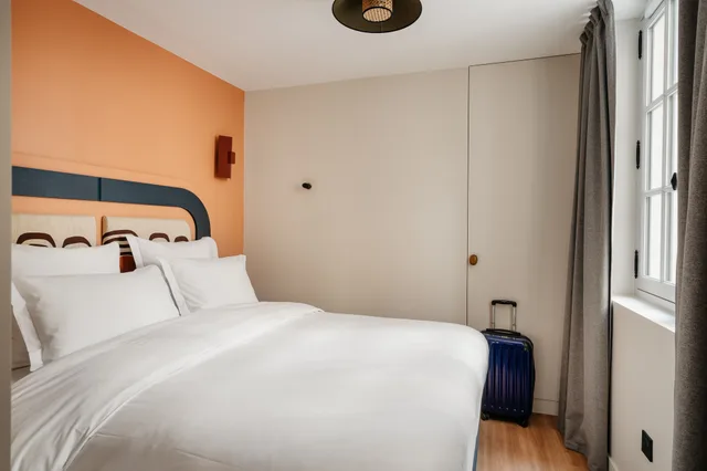 شقة بسرير كينج وسريرين كوين بـ3 غرف نوم مع أريكة، Edgar Suites Louvre - Jour 1/5