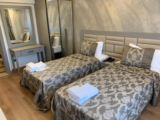 غرفة قياسية بسرير مزدوج أو سريرين منفصلين، Regency World Suite 4/7