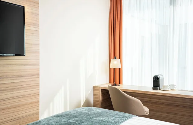 غرفة كومفورت بسريرين منفصلين، Leonardo Boutique Hotel Linz City Center 3/5