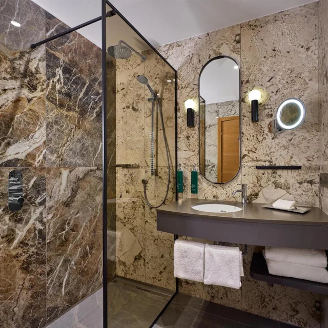 غرفة ديلوكس بسرير كينج وسرير كوين، Hilton Milan Hotel 7/7