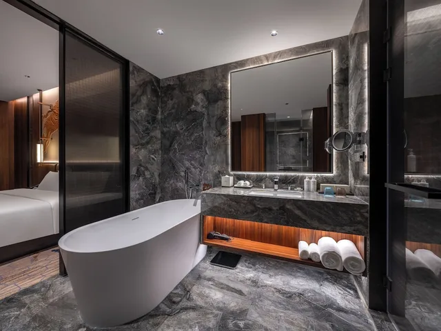 غرفة ديلوكس بسرير كينج، Howard Johnson By Wyndham Guotou Plaza Zigong 3/3