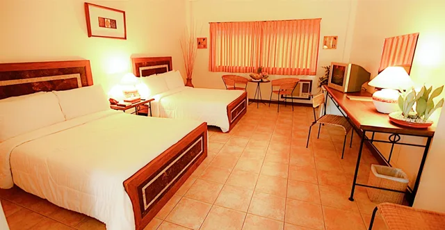 غرفة ديلوكس بسرير كوين، Citystate Asturias Hotel Palawan 1/10