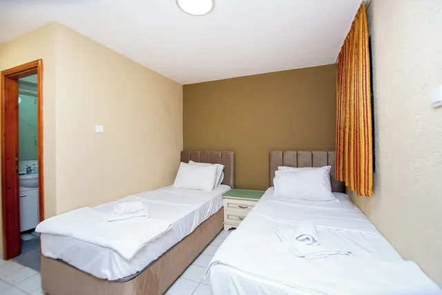جناح عائلي بسرير مزدوج وسريرين منفصلين بإطلالة على البحر، Hotel Kuc 6/10
