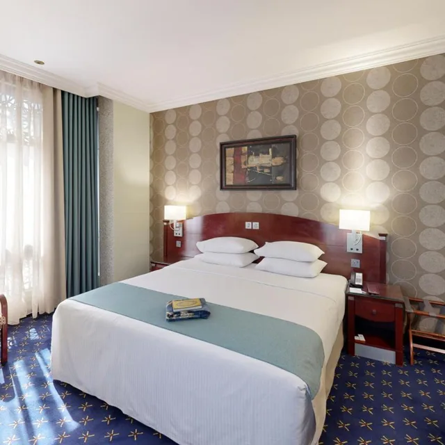غرفة بسرير مزدوج أو سريرين منفصلين، المنى كريم ليدر(Al Muna Kareem Hotel- EX Leader) 4/10