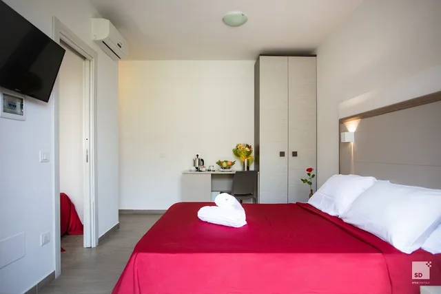 غرفة عائلية بسرير مزدوج مع أريكة، Sentido Michelizia Tropea Resort 2/5