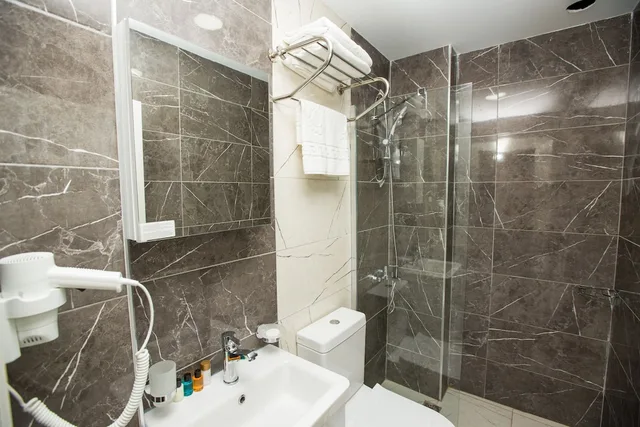 غرفة اقتصادية بسرير مزدوج، Corner Garden Hotel 2/2