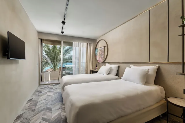 غرفة بسريرين منفصلين بإطلالة جزئية على البحر، Alanya Buyuk Hotel 1/5