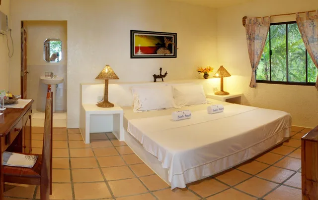 غرفة سوبيريور بسرير كوين بإطلالة على البحر، Easy Diving And Beach Resort 1/6