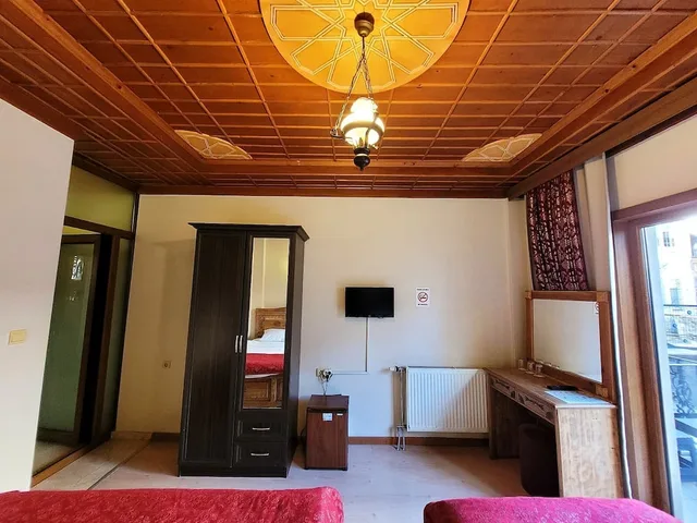 غرفة قياسية ثلاثية بسرير مزدوج وسرير فردي، Saruhan Hotel 7/8