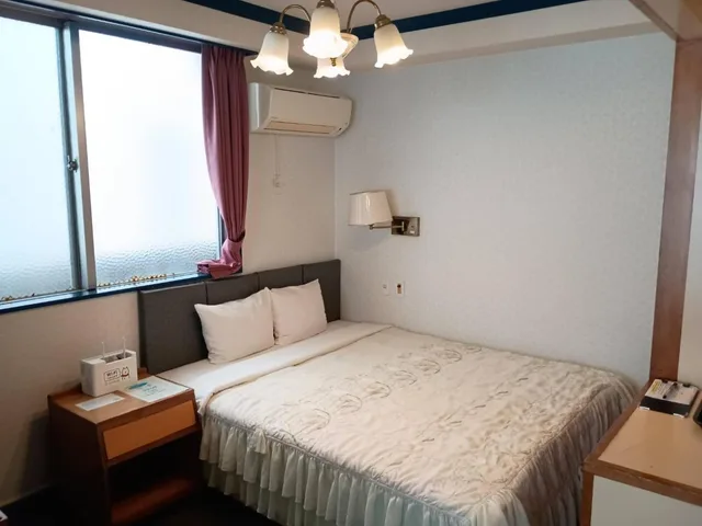 غرفة بسرير كوين، Sunrise Hotel 2/8