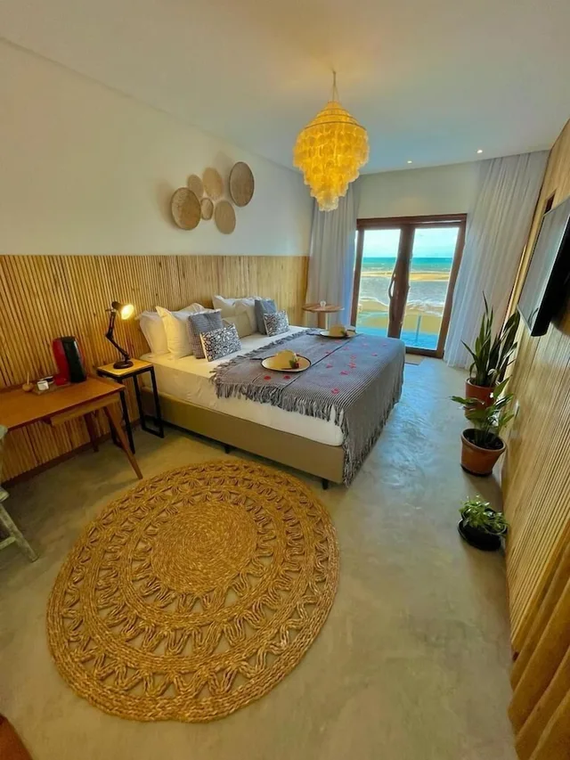 غرفة بسرير كينج بإطلالة على البحر، Villa Pantai Boutique Hotel Maragogi 1/1
