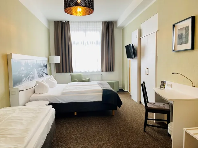 غرفة عائلية بسرير كوين وسرير فردي، Hotel Am Schlosspark 1/7