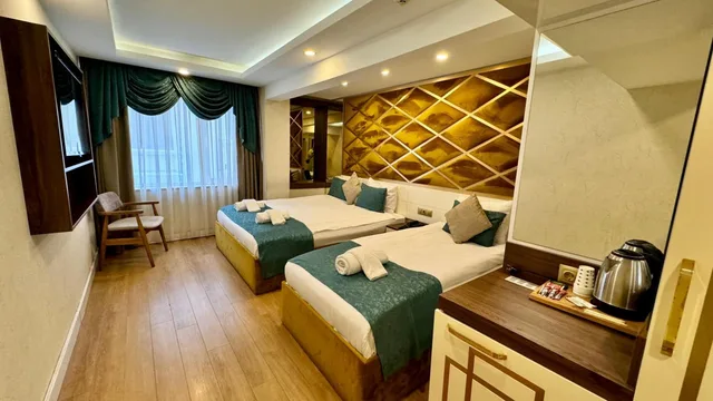 غرفة فاخرة ثلاثية بسرير مزدوج وسرير فردي، Blue Pera Istanbul Hotel 7/10