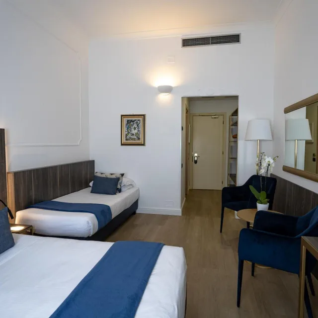غرفة كلاسيكية ثلاثية، GRAND HOTEL TIBERIO 1/10