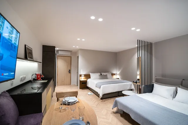 جناح ديلوكس بسرير كينج مع أريكة، Alinea Suites Limassol Center 2/3