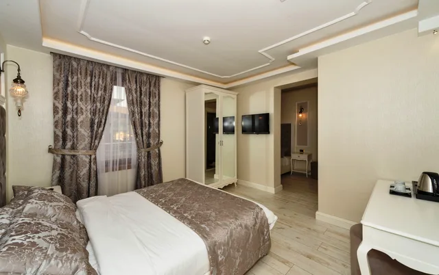 غرفة قياسية ثلاثية بسرير فردي، Zeynep Sultan Hotel 3/6