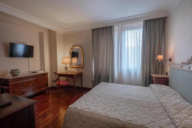 غرفة بسرير مزدوج أو سريرين منفصلين، Relais Ducale 1/7