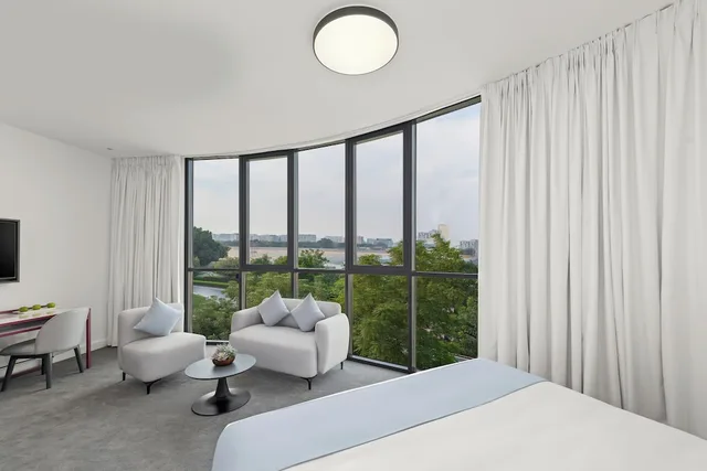 غرفة سيغنتشر بسرير كينج، Nest Hotel Aljada 3/4