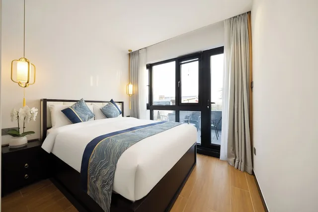 غرفة رباعية بسريرين مزدوجين وسرير كينج وسرير كوين بشرفة، Beijing Aaliyah Wang Fu Jing Forbodden City Boutique Hotel 7/10