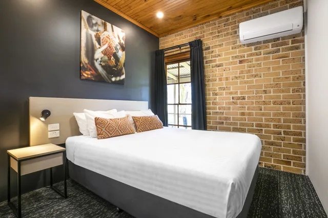 شقة بسرير كوين وسريرين منفصلين بغرفتي نوم مع أريكة، Macquarie Inn 1/10