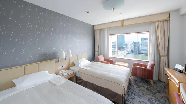 غرفة قياسية بسريرين منفصلين بإطلالة على النهر في المبنى الرئيسي، Hotel Okura Niigata 1/1