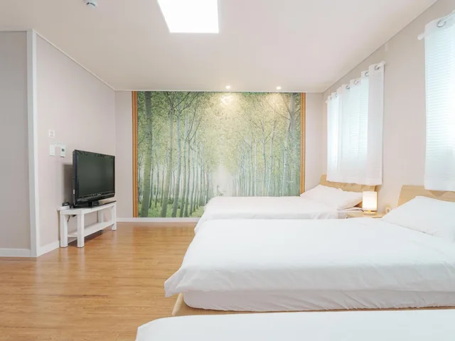 غرفة عائلية، Rainbootsguesthouse 2/2
