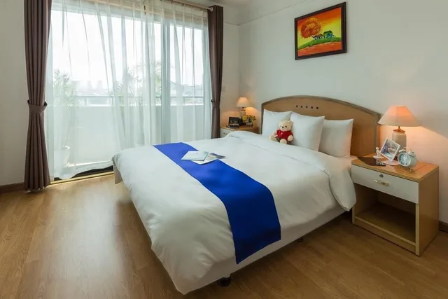 شقة ديلوكس بسرير كوين بإطلالة على المدينة بغرفة نوم واحدة، ROSE GARDEN RESIDENCES 1/4