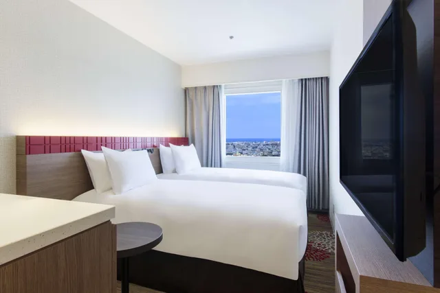 غرفة اقتصادية بسريرين منفصلين، DoubleTree by Hilton Hotel Naha Shuri Castle 2/4
