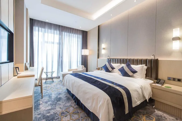 غرفة تنفيذية بسرير كينج بإطلالة على المدينة، Grand Metropark Hotel Liyuan Chongqing 3/5