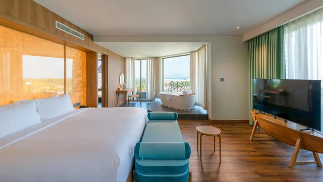 Vip, Family Suite, King and Twin Beds, Living Area، Bellerive Hoi An Resort & Spa 1/2