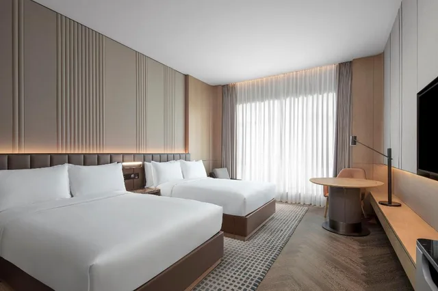 غرفة سوبيريور ديلوكس بسريرين منفصلين وسريرين مزدوجين في طابق مرتفع، Courtyard by Marriott Taiyuan 1/2