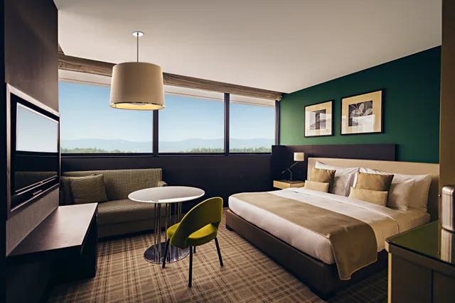 غرفة ديلوكس بسرير كينج، Crowne Plaza Geneva 1/2