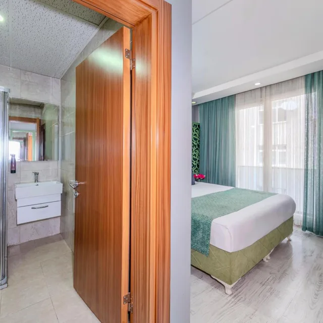 غرفة ديلوكس بسرير مزدوج، Green Garden Hotel 7/9