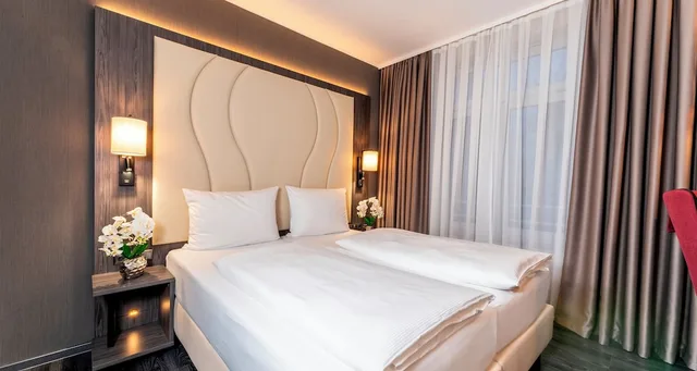 غرفة قياسية بسريرين منفصلين بإطلالة على الفناء، PLAZA Premium Parkhotel Norderstedt 2/7