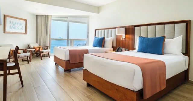 غرفة ملكية بسريرين مزدوجين بإطلالة على البحر، Park Royal Beach Ixtapa All Inclusive 3/8