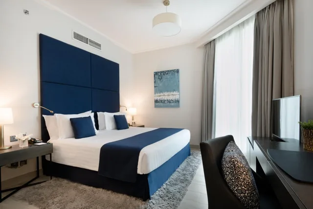 إقامة تنفيذية بسرير كينج بإطلالة على المدينة بغرفتي نوم، Centara West Bay Hotel and Residences Doha 1/4