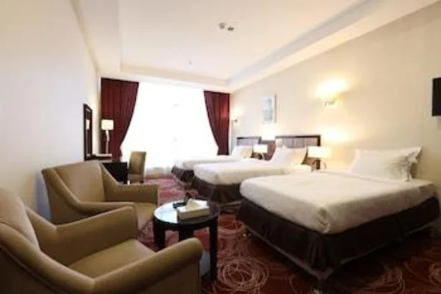 غرفة قياسية ثلاثية بثلاثة أسرّة، ابراج الريان المكية(Al Rayyan Makiya Towers Hotel) 2/2