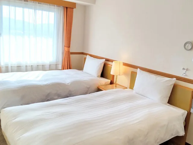 غرفة قياسية بسريرين منفصلين، Toyoko Inn Kokura-eki Shinkansen-guchi 1/4