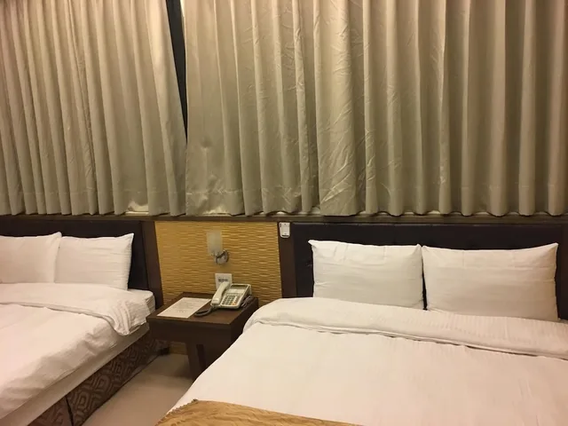 غرفة ديلوكس رباعية بسريرين مزدوجين، Ri Yue Hu Pan Hotel 3/4