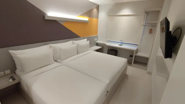 غرفة عائلية ثلاثية بسرير كوين، Agogo Downtown Hotel Surabaya 1/1