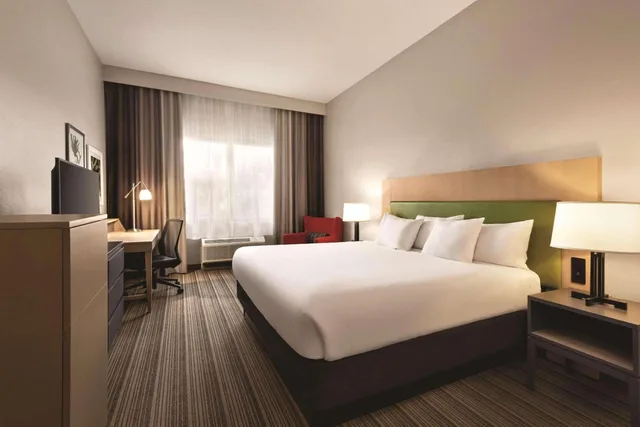 استوديو بسرير كينج مع أريكة، Country Inn & Suites by Radisson, Bradenton-Lakewood Ranch, FL 6/9