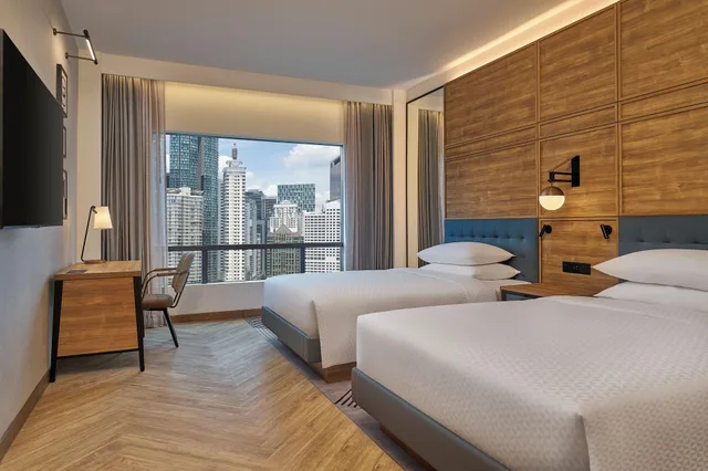 غرفة ديلوكس رباعية بسريرين مزدوجين، Four Points by Sheraton Kuala Lumpur, City Centre 1/3
