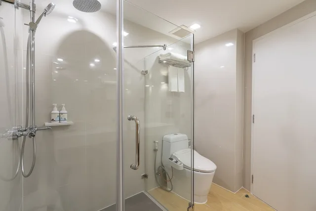 غرفة غراند ديلوكس بسريرين منفصلين وسرير كينج، Aster Hotel And Residence Pattaya 4/5