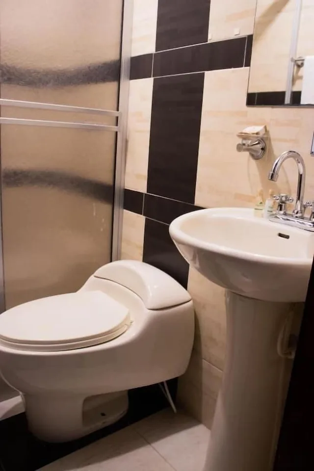 غرفة ثلاثية بثلاثة أسرّة، Nogal Suite Hotel Pasto 6/7